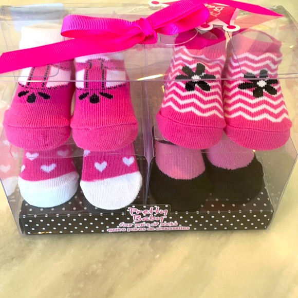 Pretty Baby. 4 pairs of baby socks 0-6 months - Picture 1 of 5